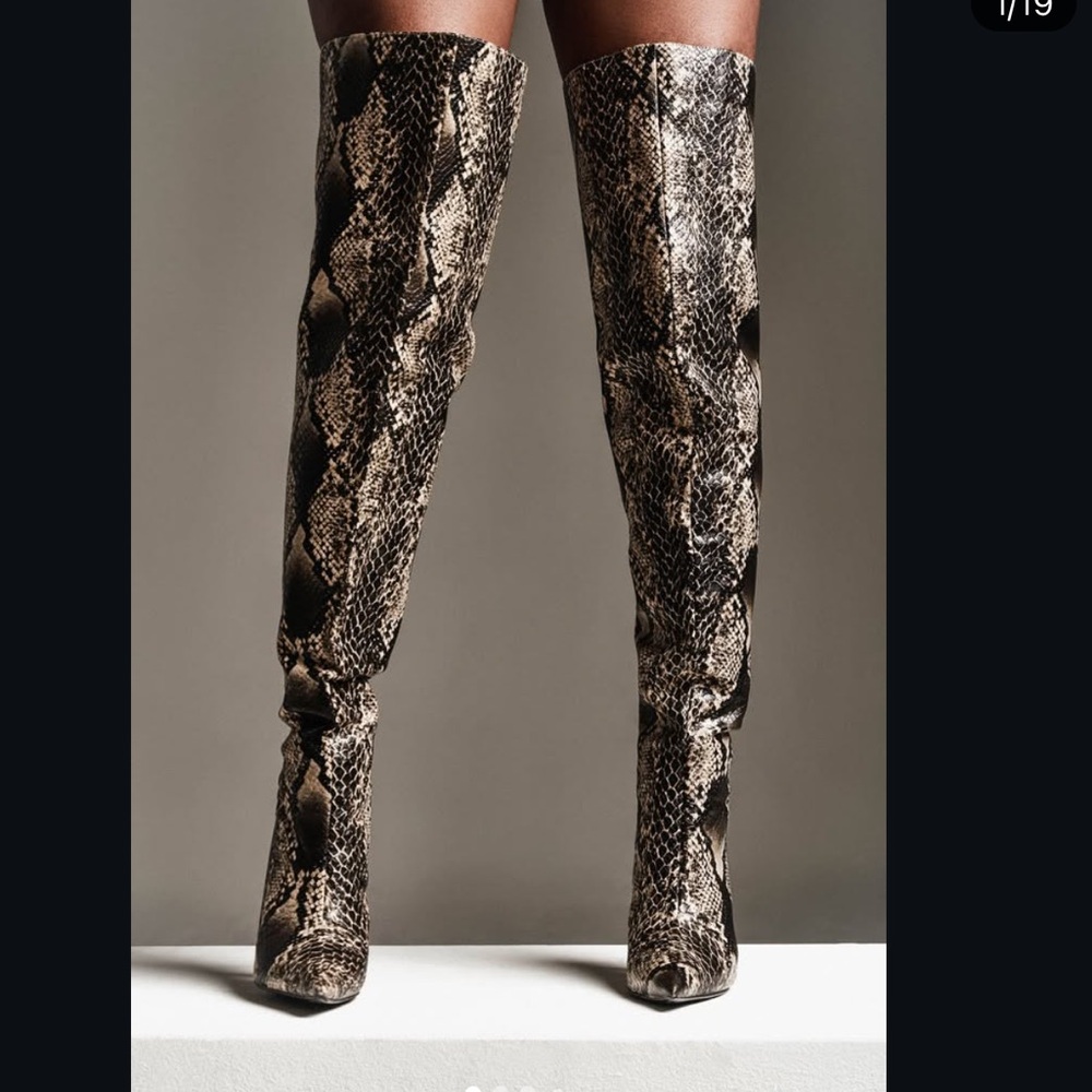 Snakeskin over the knee boots